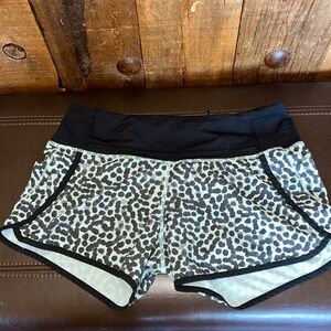 Lululemon Athletica Seafoam green and black athletic shorts.